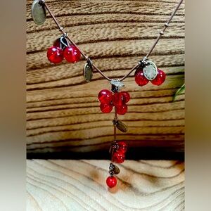 Red glass and copper toned necklace